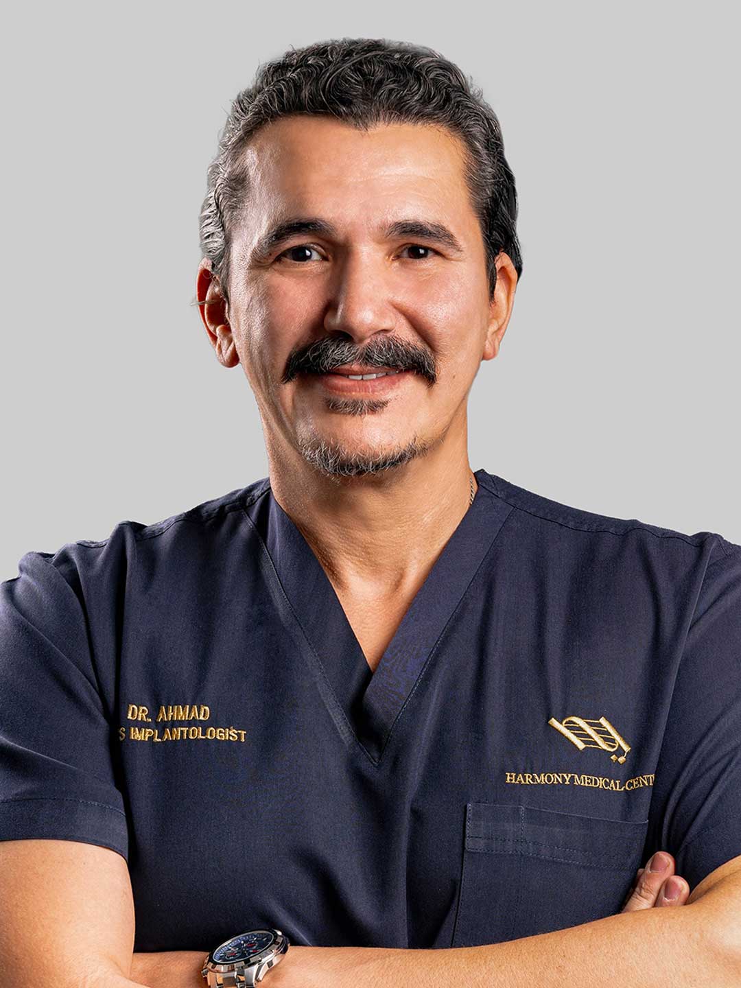 Portrait of Dr. Ahmad Al Jazairi - Medical Director and Head of Oral & Maxillofacial Surgery at Harmony Medical Center Dubai and Abu Dhabi