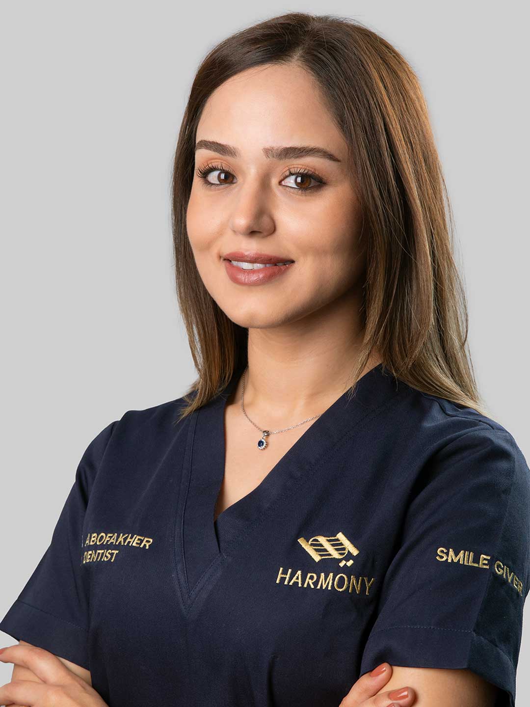Portrait of Dr. Aya Abofakher - General Dentist at Harmony Medical Center in Abu Dhabi