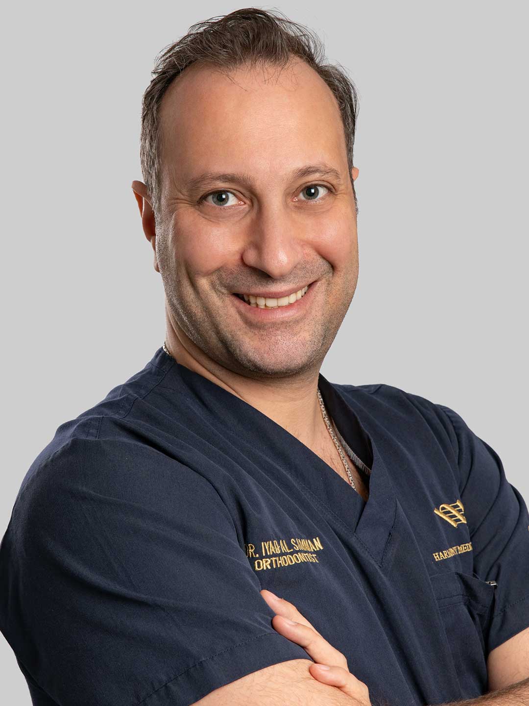 Portrait of Dr. Iyad Al Samman – Head of Orthodontics and Specialist Orthodontist at Harmony Medical Center