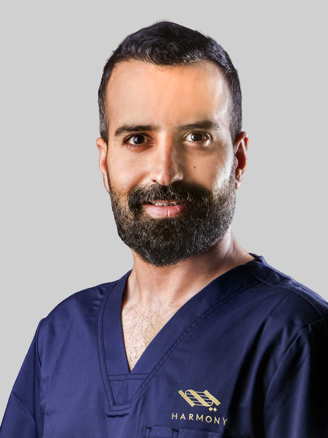 Portrait of Dr. Ousama Obeid Alnasser - Specialist Pediatric Dentist at Harmony Medical Center in Dubai and Abu Dhabi