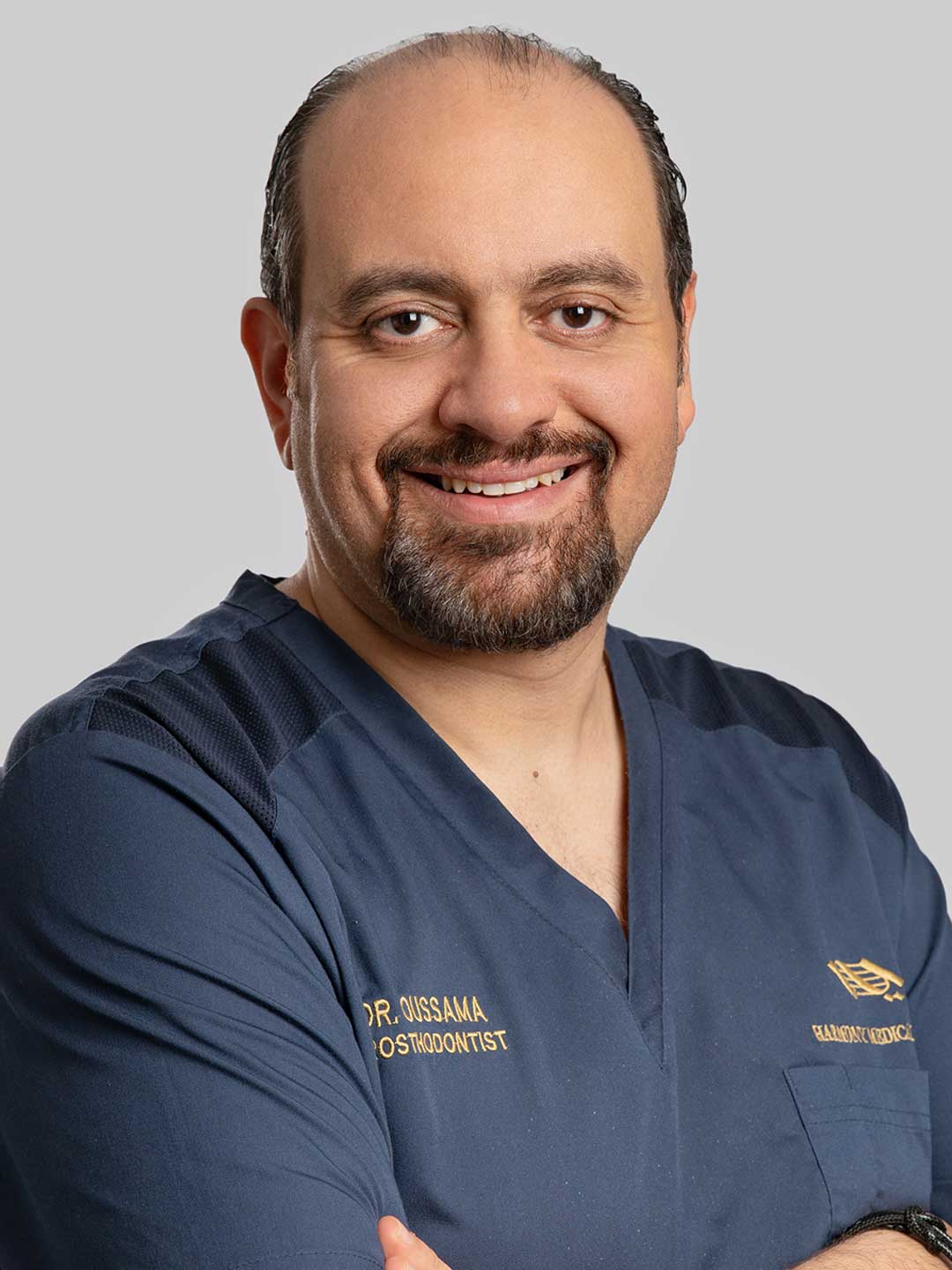 Portrait of Dr. Oussama Alaoui - Head of the Prosthodontics Department at Harmony Medical Center in Dubai and Abu Dhabi