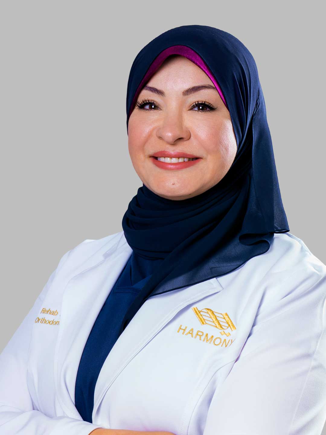 Portrait of Dr. Rehab Elsayed - Specialist Orthodontist at Harmony Medical Center in MBZ City, Abu Dhabi