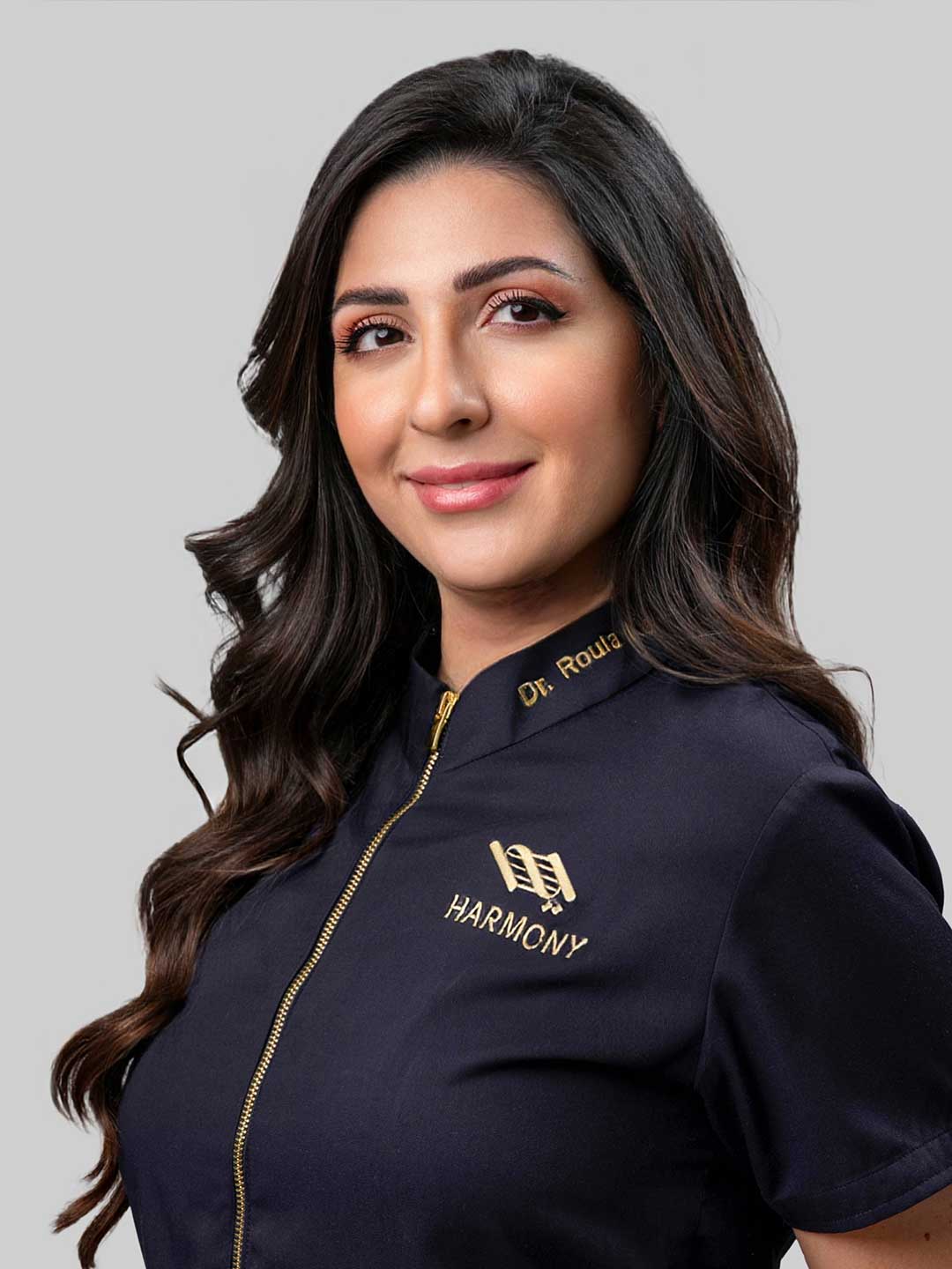 Portrait of Dr. Roula Kilani - Cosmetic Dentist with MSc in Periodontology at Harmony Medical Center in Dubai