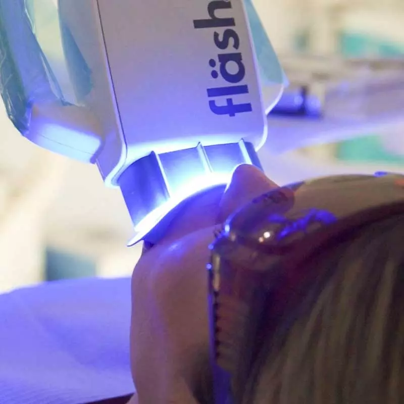 Flash in-office teeth whitening session at Harmony Medical Center in Dubai.