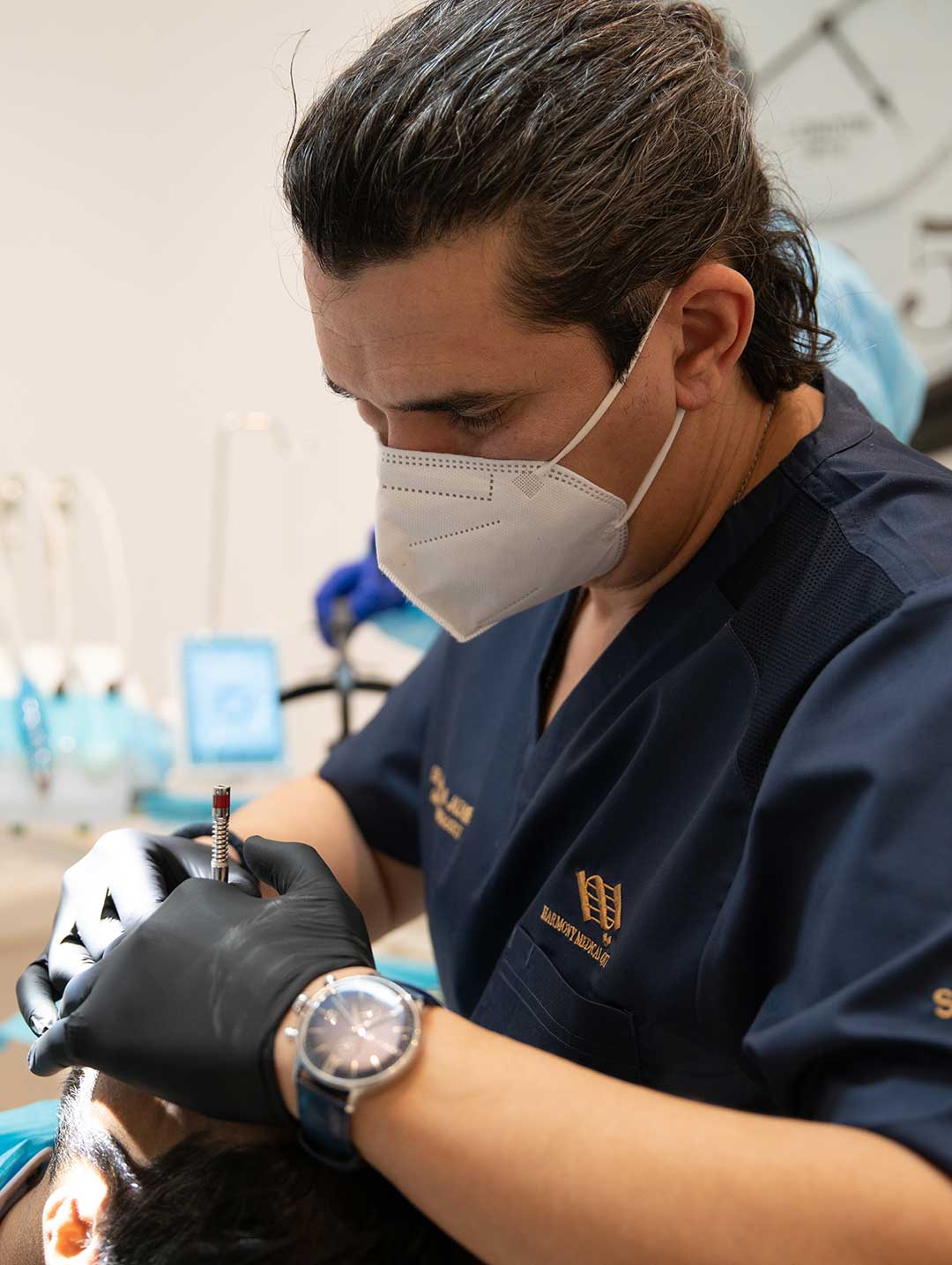 Dr. Ahmad Al Jazairi, Medical Director and Head of Oral & Maxillofacial Surgery at Harmony Medical Center, performs a sinus lift to help a patient build bone for dental implants.